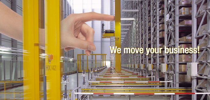 A finger is pushing a automated storage / retrieval system (AS/RS) 